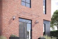 Vordach PUNTO an Klinker Fassade